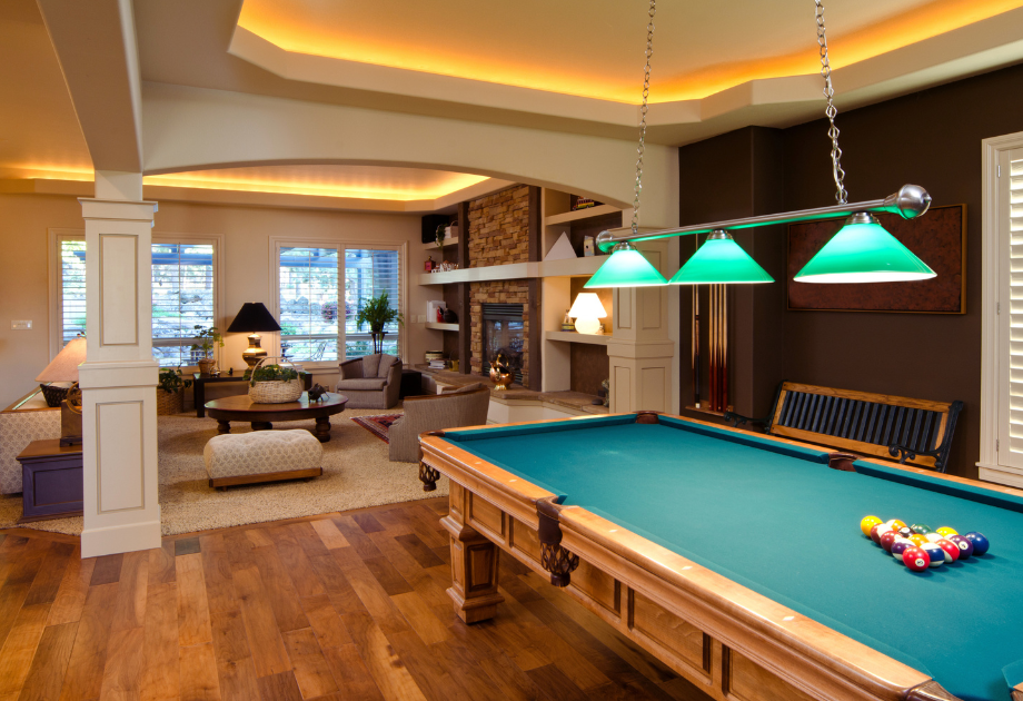 entertainment room in a house with a pool table+